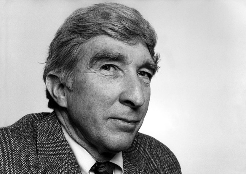 Portrait of John Updike peering at the camera. Image Credit: Ulf Andersen